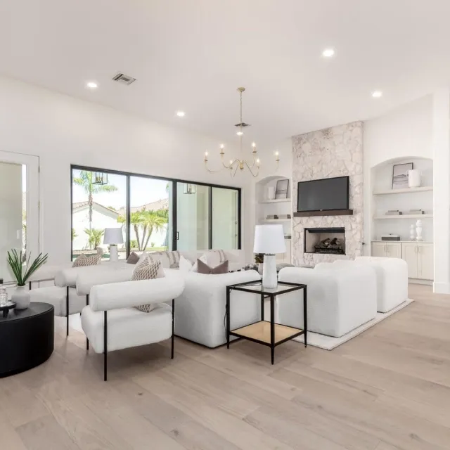 Luxurious Living Room With Stone Fireplace And Arches Shelf Niches